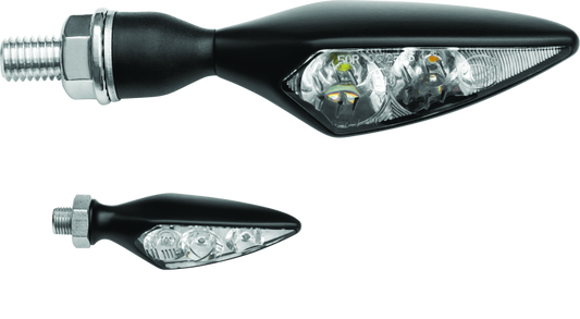 Kuryakyn Rhombus S front left amber turn signal with clear lens for motorcycle, showing the rhombus-shaped amber light and clear lens cover.