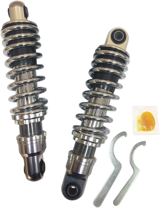 Chrome shock absorber for Harley-Davidson FXD, 10.5-inch premium Drag Specialties shocks installed on motorcycle.