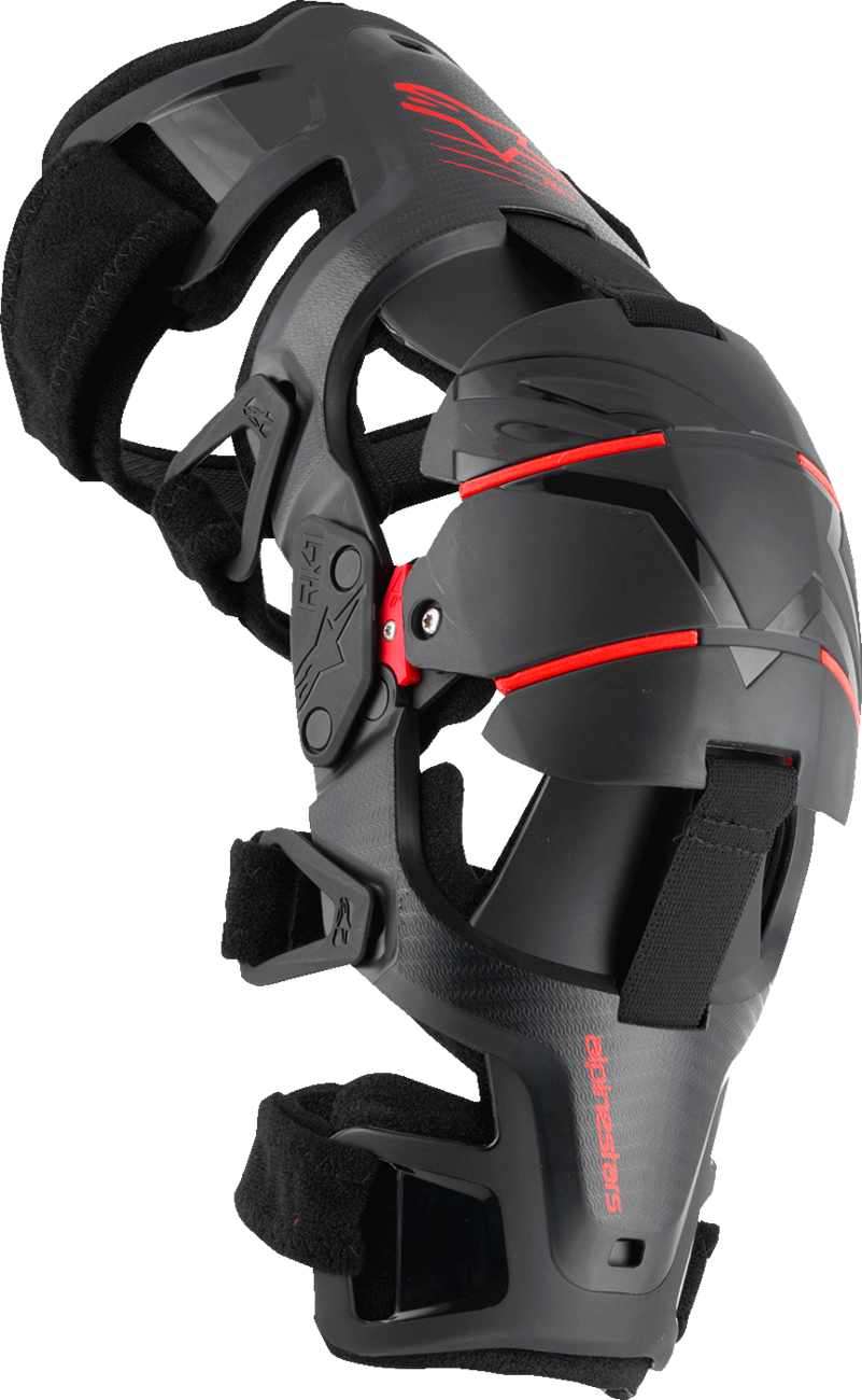 Alpinestars RK-1 Plasma Knee Braces in black and red, small/medium size, showing the protective knee support design.