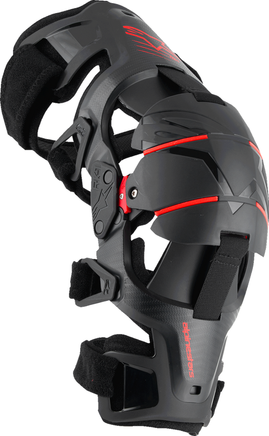 Alpinestars RK-1 Plasma Knee Braces in black and red, small/medium size, showing the protective knee support design.