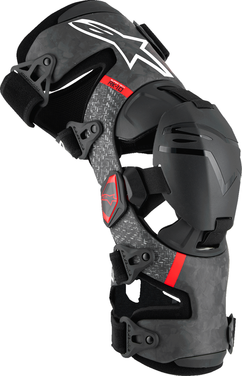 Alpinestars Supertech RK-10 Plasma knee braces in black and red, small size, showing the protective design and straps.