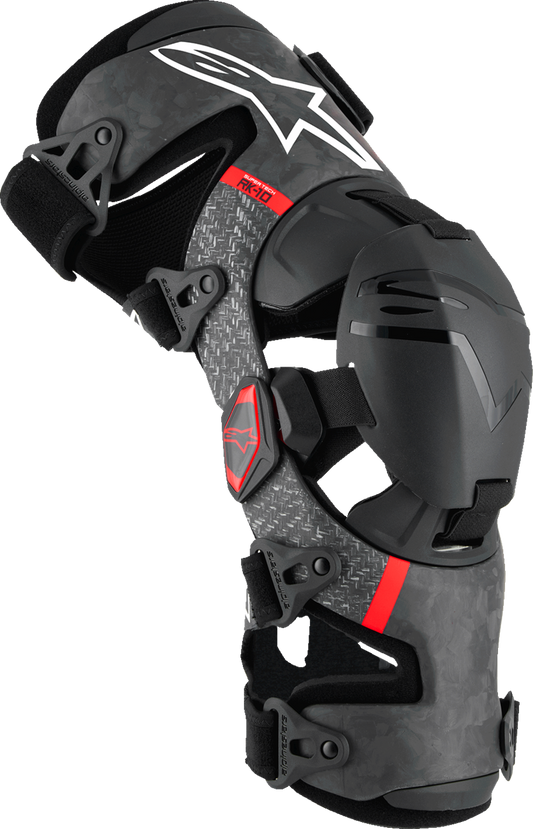 Alpinestars Supertech RK-10 Plasma knee braces in black and red, small size, showing the protective design and straps.