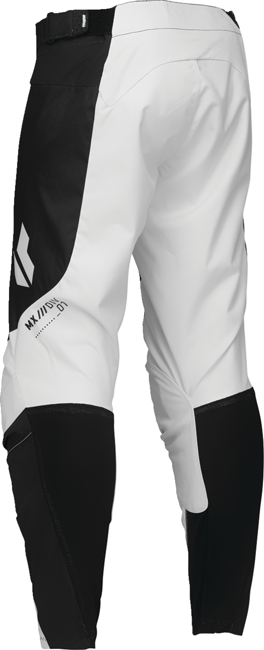 Black THOR Launchmode Storm Pants with reinforced knees and adjustable waist in US size 34, designed for motorcycle riding.