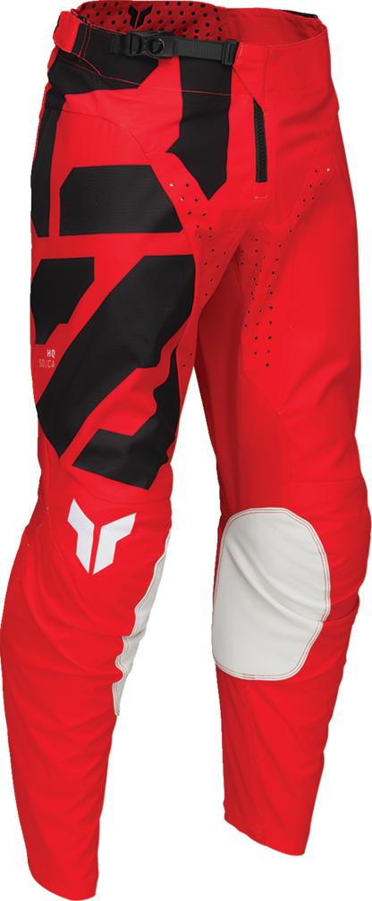 Red THOR Launchmode Forge motocross pants with reinforced fabric, ventilation panels, and US size 30 for durable riding comfort.