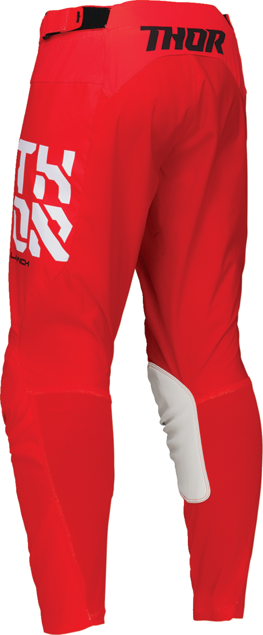 Red THOR Launchmode Forge motocross pants with reinforced fabric and ventilation, designed for durability and comfort.