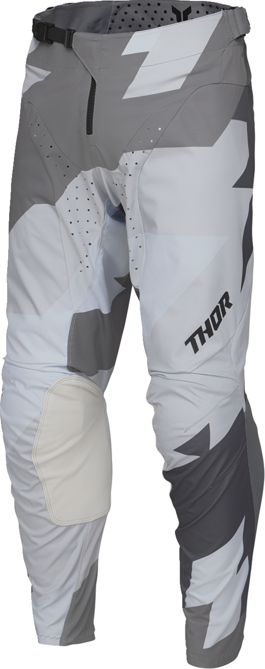 Black and gray THOR Launchmode Brave motocross pants with ventilation and durable design, US size 28, shown on a rider.