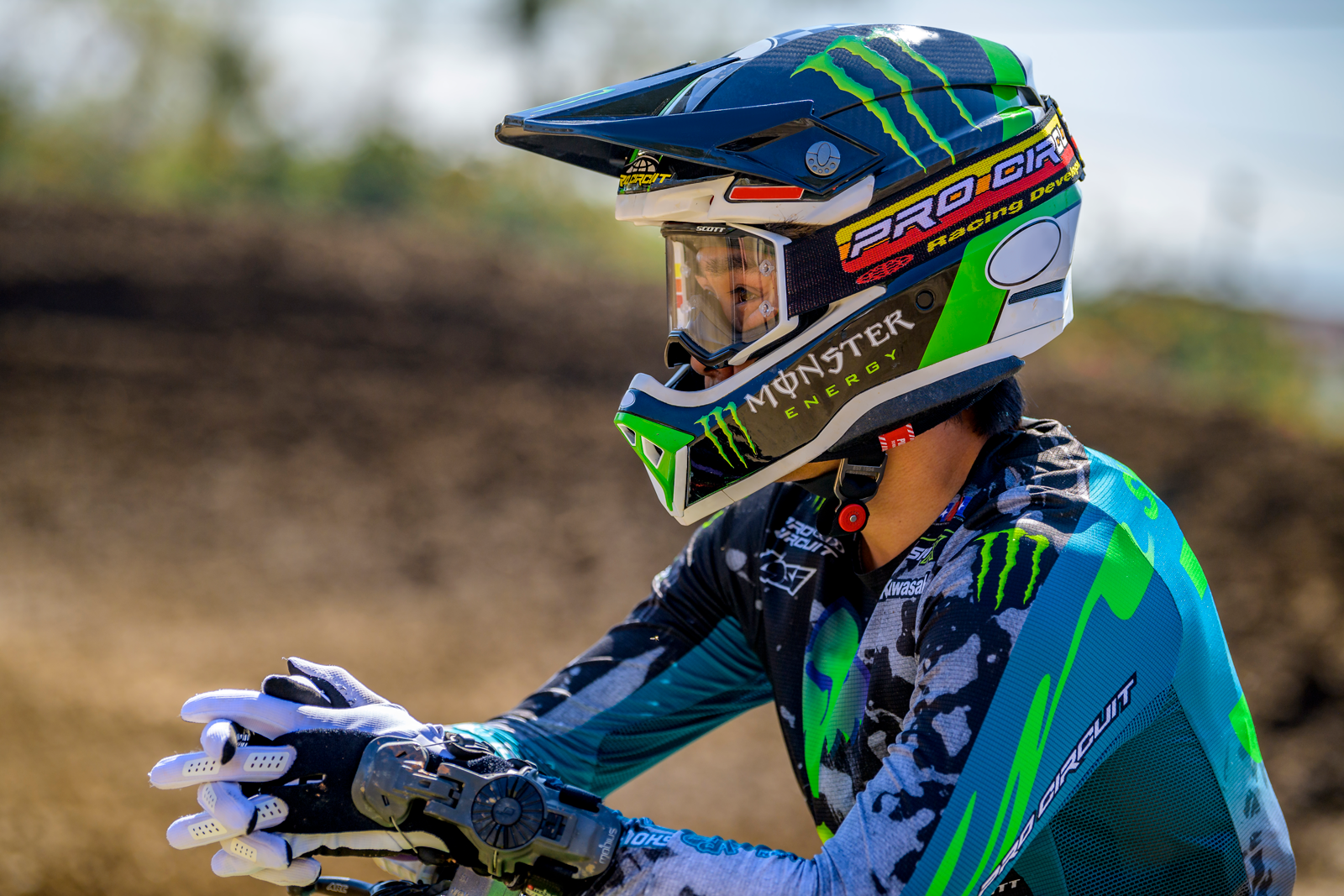 Scott Pro Circuit Prospect goggles in black and white with yellow accents, featuring clear lenses and adjustable strap.