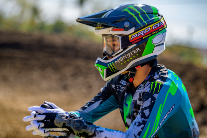 Scott Pro Circuit Prospect goggles in black and white with yellow accents, featuring clear lenses and adjustable strap.