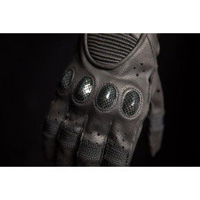 Black ICON Outdrive gloves in 3XL size by Bill's Exhausts, showing close-up of textured fabric and secure wrist closure.