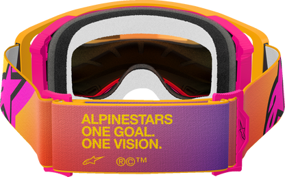 Alpinestars Supertech goggles with fluo yellow frame and red mirror lens, featuring ABS Vision for motorcycle racing protection.