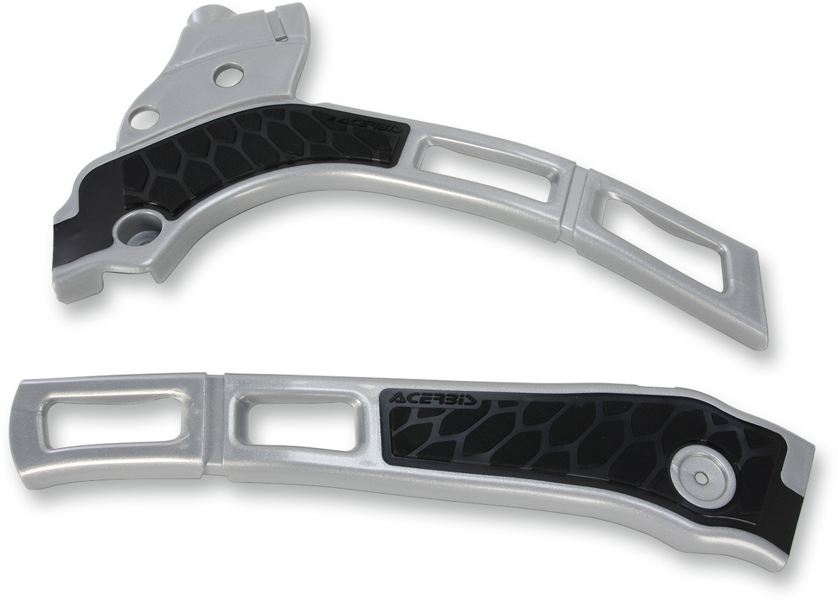 Acerbis X-Grip frame guards in silver and black installed on a motorcycle frame, providing protection and style.