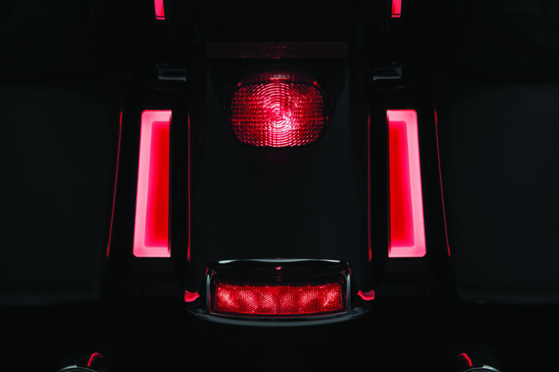 Kuryakyn Tracer LED inserts for saddlebag supports in black, designed to enhance motorcycle visibility and style.