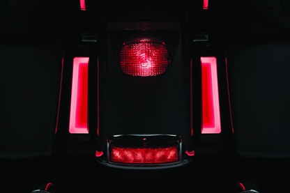 Kuryakyn Tracer LED inserts for saddlebag supports in black, designed to enhance motorcycle visibility and style.