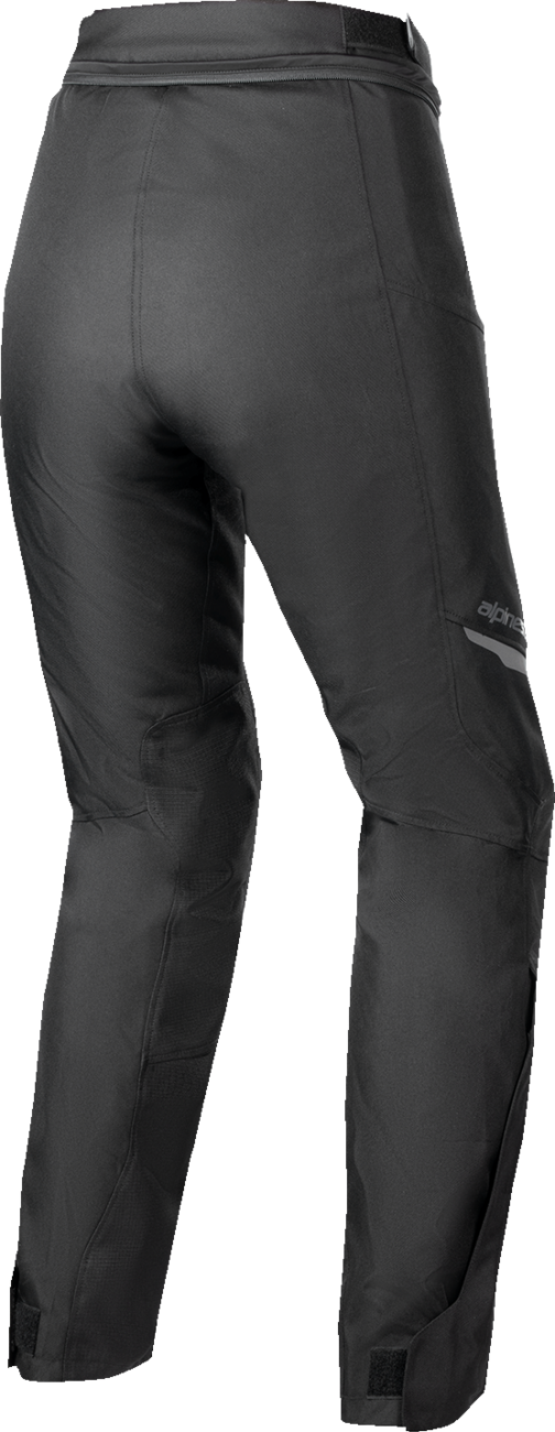 Alpinestars Stella ST-1 Waterproof Pants in black, size large, shown on a model with waterproof material and protective design.