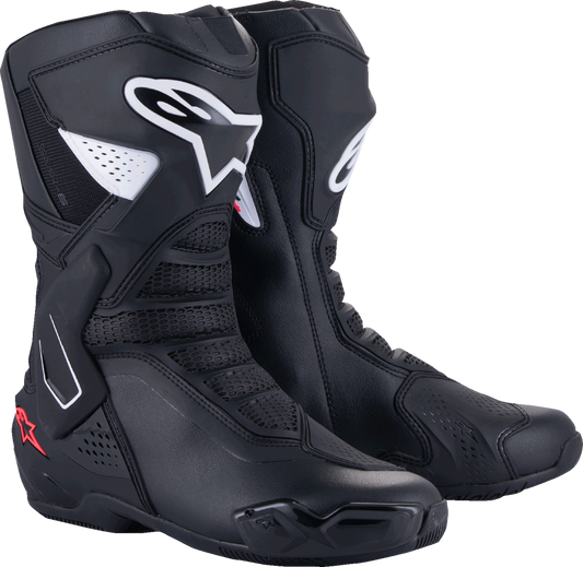 Alpinestars Stella SMX-6 V3 women’s motorcycle racing boots in black, white, and pink with protective features and adjustable straps.