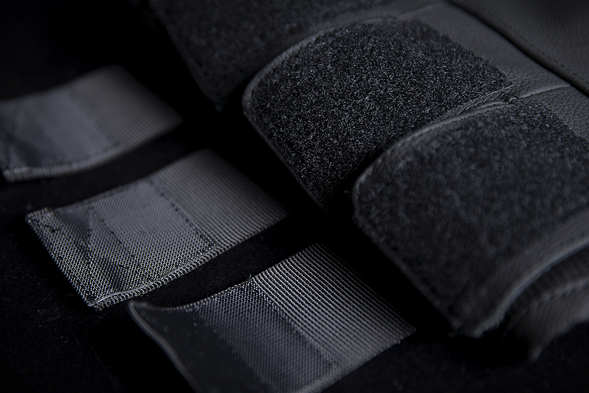 Black ICON Regulator™ D30® Stripped Vest by Bill's Exhausts, size L/XL, featuring lightweight protective armor and adjustable straps.