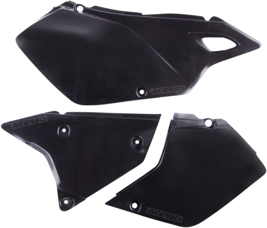 Black Acerbis side panels for motorcycle body, designed for durability and fit, shown on a vehicle in the image.