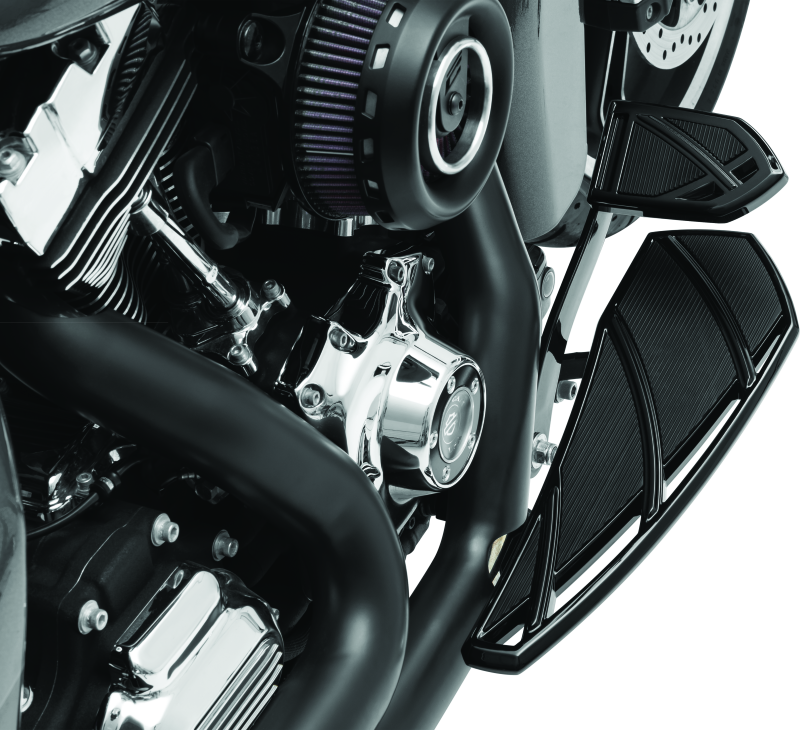 Kuryakyn Phantom floorboards for Harley-Davidson in black, showing sleek design and textured surface for rider comfort.