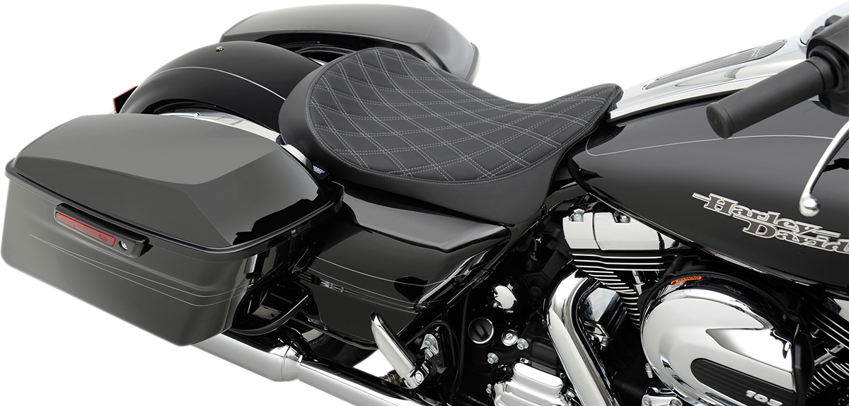 Low solo seat by Drag Specialties with double diamond silver stitching for Harley FL models 2008-2023, shown in silver stitches.