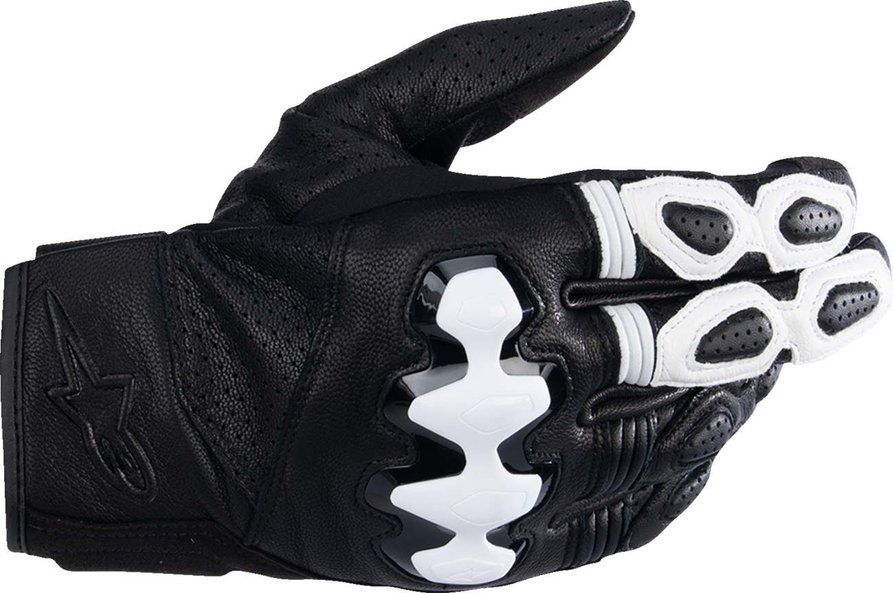 Black and white ALPINESTARS Celer V3 motorcycle gloves in large size, with protective knuckles and adjustable wrist straps.