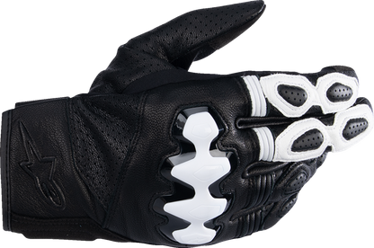 Black and white ALPINESTARS Celer V3 motorcycle gloves in large size, with protective knuckles and adjustable wrist straps.