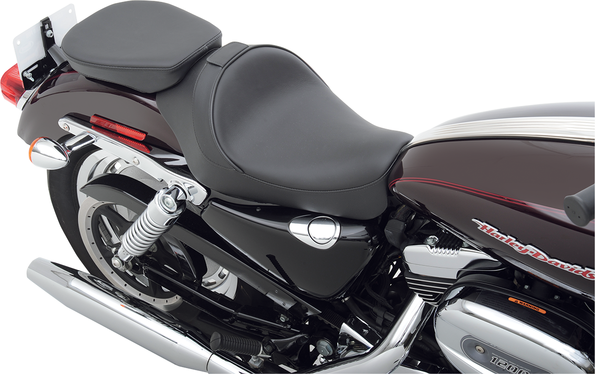 Rear solo seat for XL models by Drag Specialties, wide design with smooth finish, fits 2004-2022 Harley-Davidson motorcycles