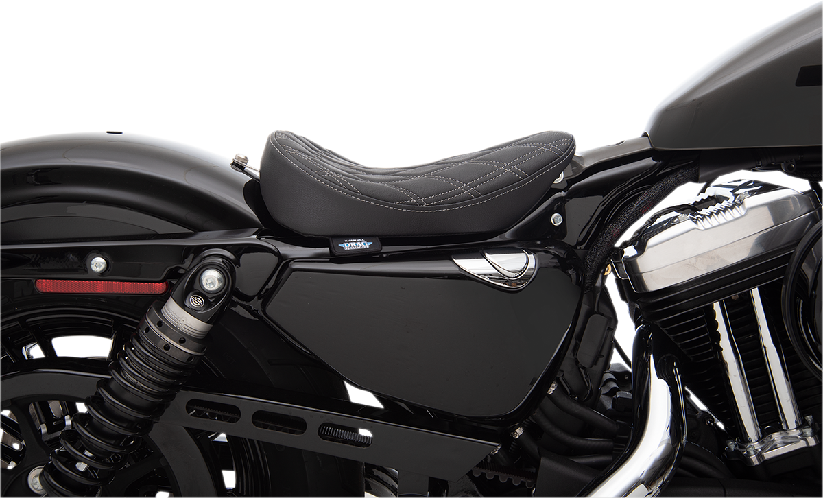 Drag Specialties Bobber Solo Seat with silver stitching for 2010-2022 Harley-Davidson XL models, featuring a classic double diamond pattern.