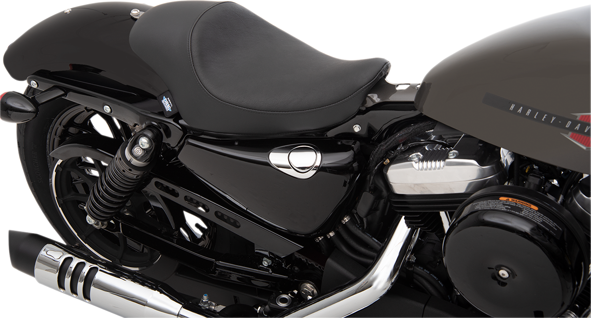 Black smooth 3/4 solo seat for Harley-Davidson XL by Drag Specialties, designed for improved comfort and stylish look.