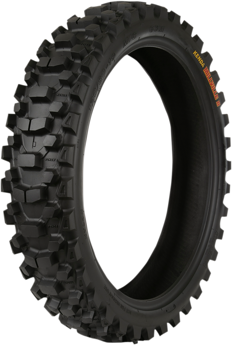 Kenda K785 Millville II rear motorcycle tire 110/90-19 mounted on wheel, showing tread pattern and sidewall details.