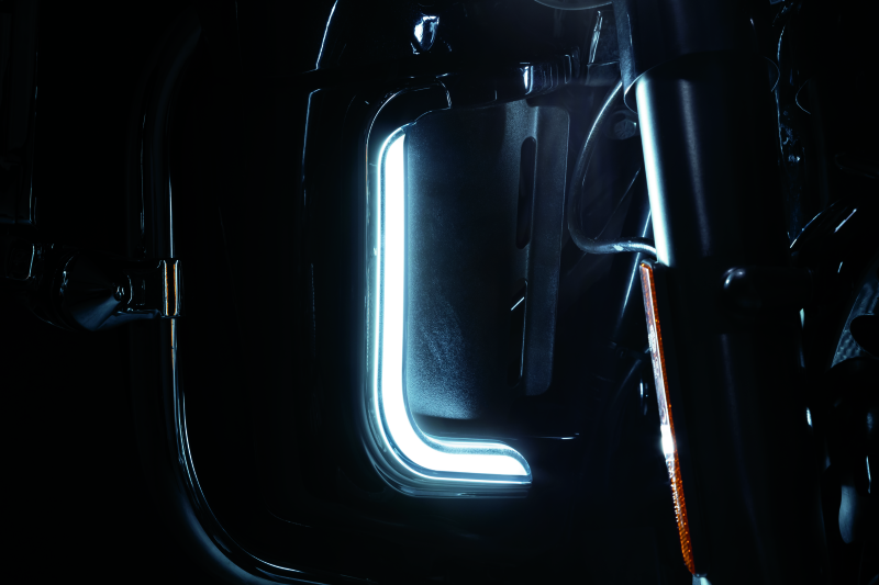 Kuryakyn Tracer LED fairing lower accents in chrome for Harley Davidson Touring models, showing the sleek, illuminated LED design.