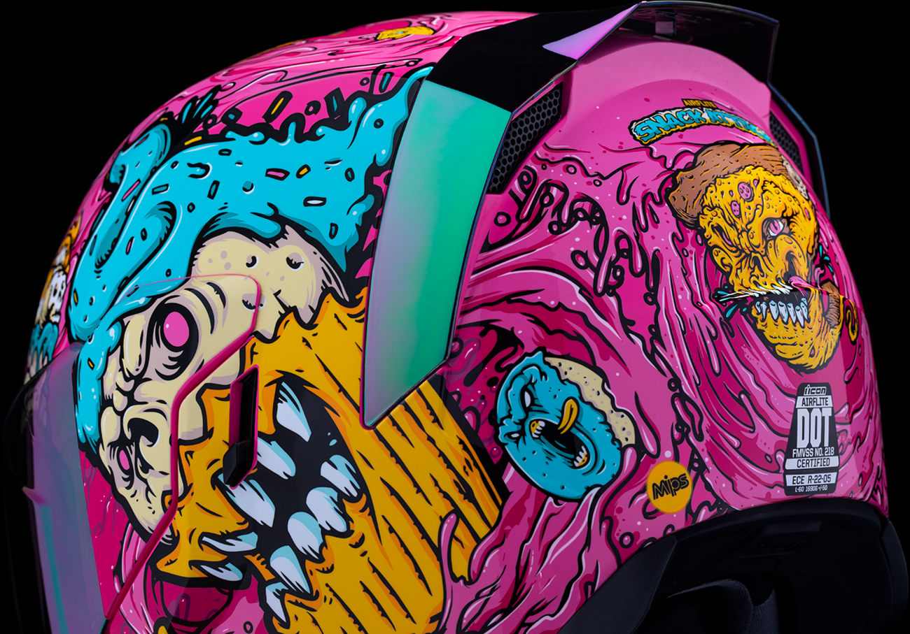 Pink ICON Airflite™ Helmet with Snack Attack design, XS size, MIPS® safety features, shown from a side angle.