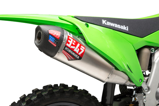 YOSHIMURA RS-4 exhaust slip-on with header, canister, and end cap showing polished metal components and mounting details