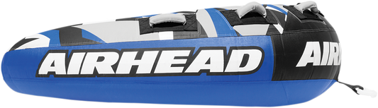 Airhead Super Slice towable water tube on water, featuring bright colors and multiple handles for fun water sports.
