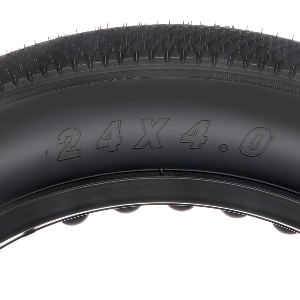 Hycline HyperPave e-bike and fat bike tire with rugged tread for off-road riding, shown in close-up view.