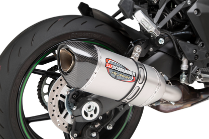 YOSHIMURA RS-12 ADV Street Alpha slip-on motorcycle exhaust for Kawasaki, featuring a sleek metal finish and compact design.