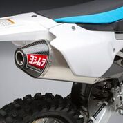 YOSHIMURA RS-4 exhaust slip-on with header, canister, and end cap for enhanced motorcycle performance, shown in the image.