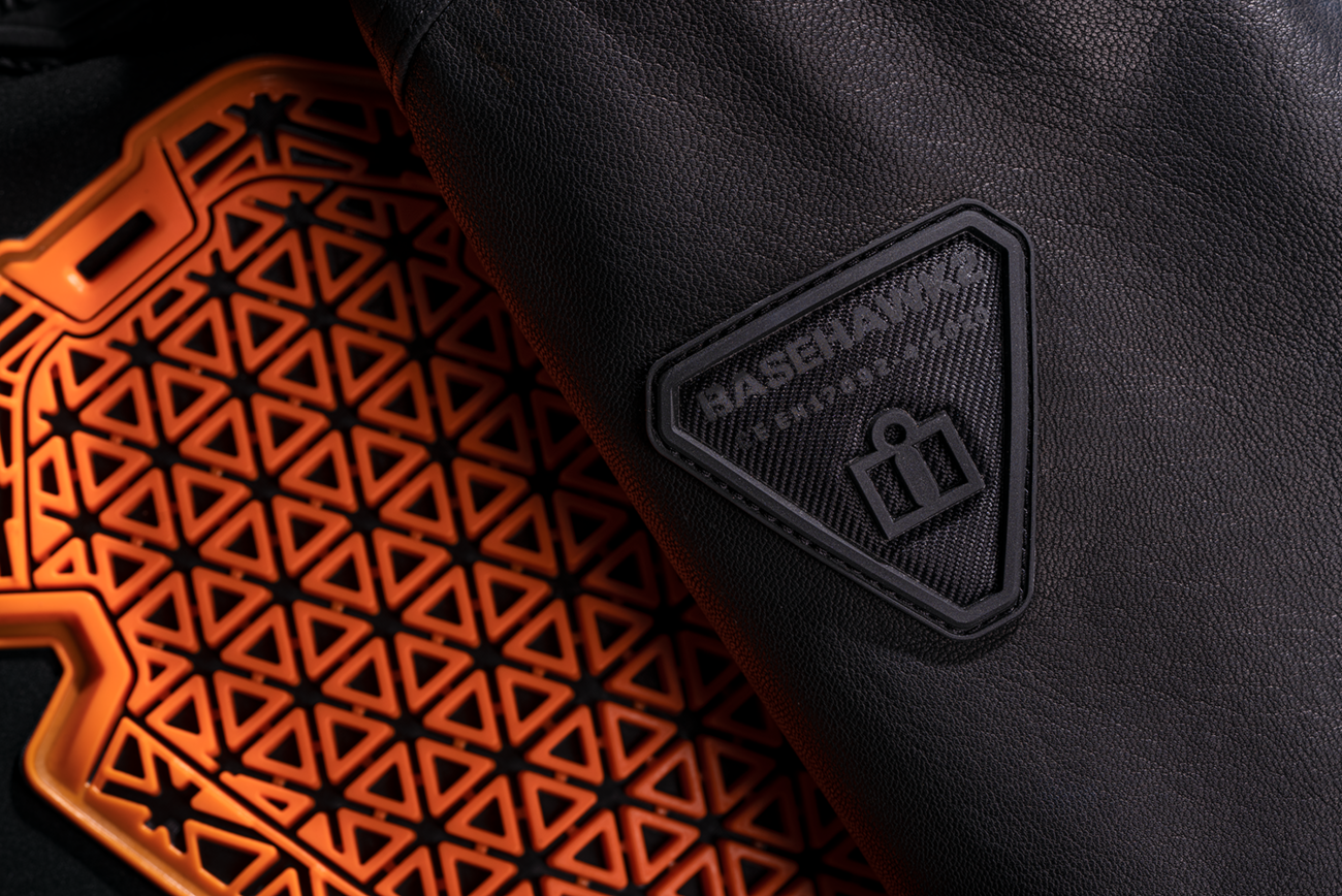 Black ICON Basehawk2 jacket in small size, featuring a sleek design and durable fabric, by Bill's Exhausts.