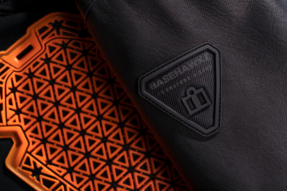 Black ICON Basehawk2 jacket in small size, featuring a sleek design and durable fabric, by Bill's Exhausts.