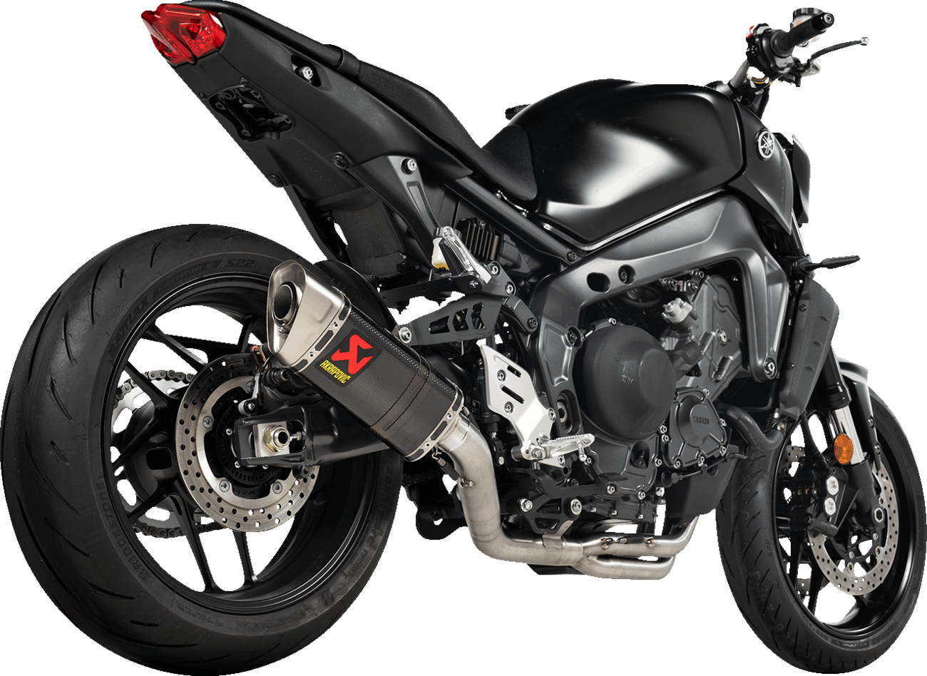 AKRAPOVIC Racing Line exhaust system for Yamaha MT-09 with carbon fiber and titanium parts, featuring sleek metal and branding.