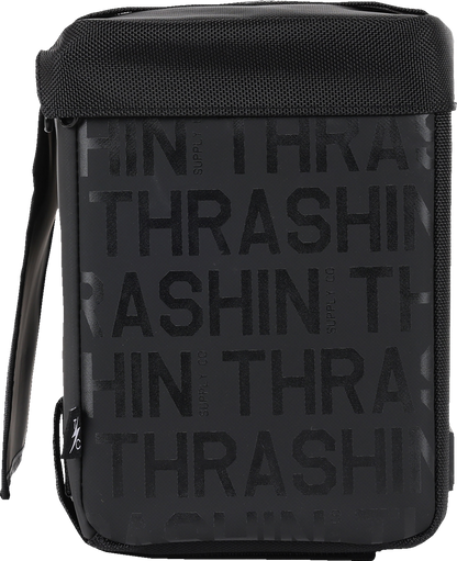 Motorcycle with black leather Thrashin Supply Co. essential saddlebags, 10-liter capacity, mounted on the sides of the bike.