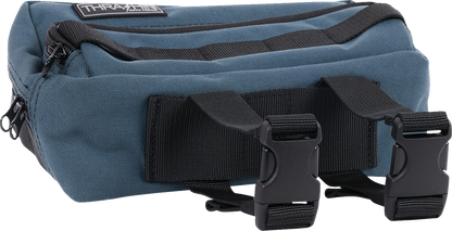 Blue handlebar bag from THRASHIN SUPPLY CO., featuring a compact design with adjustable straps for bike storage.