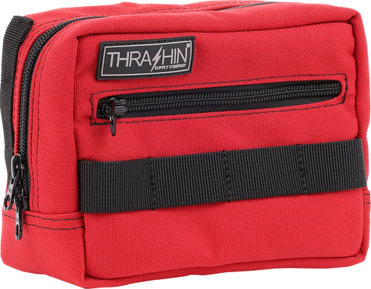 Red THRASHIN SUPPLY CO. handlebar bag with adjustable straps and zip closure, mounted on a bicycle handlebar.