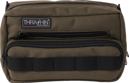Green THRASHIN SUPPLY CO. Handlebar Bag Plus mounted on a bicycle handlebar, showcasing its compact design and durable material.