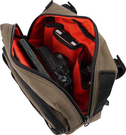 Green handlebar bag from THRASHIN SUPPLY CO., part of the Handlebar Bag Plus series, designed for bike storage.