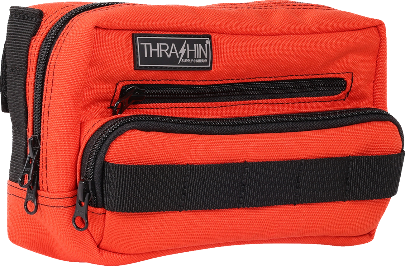 Orange handlebar bag from THRASHIN SUPPLY CO., featuring a durable design with adjustable straps for bike storage.