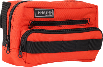 Orange handlebar bag from THRASHIN SUPPLY CO., featuring a durable design with adjustable straps for bike storage.