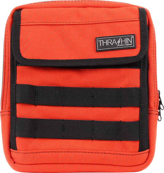 Orange THRASHIN SUPPLY CO. Handlebar Bag Slim (THB-0035) attached to a bicycle handlebar for storage.