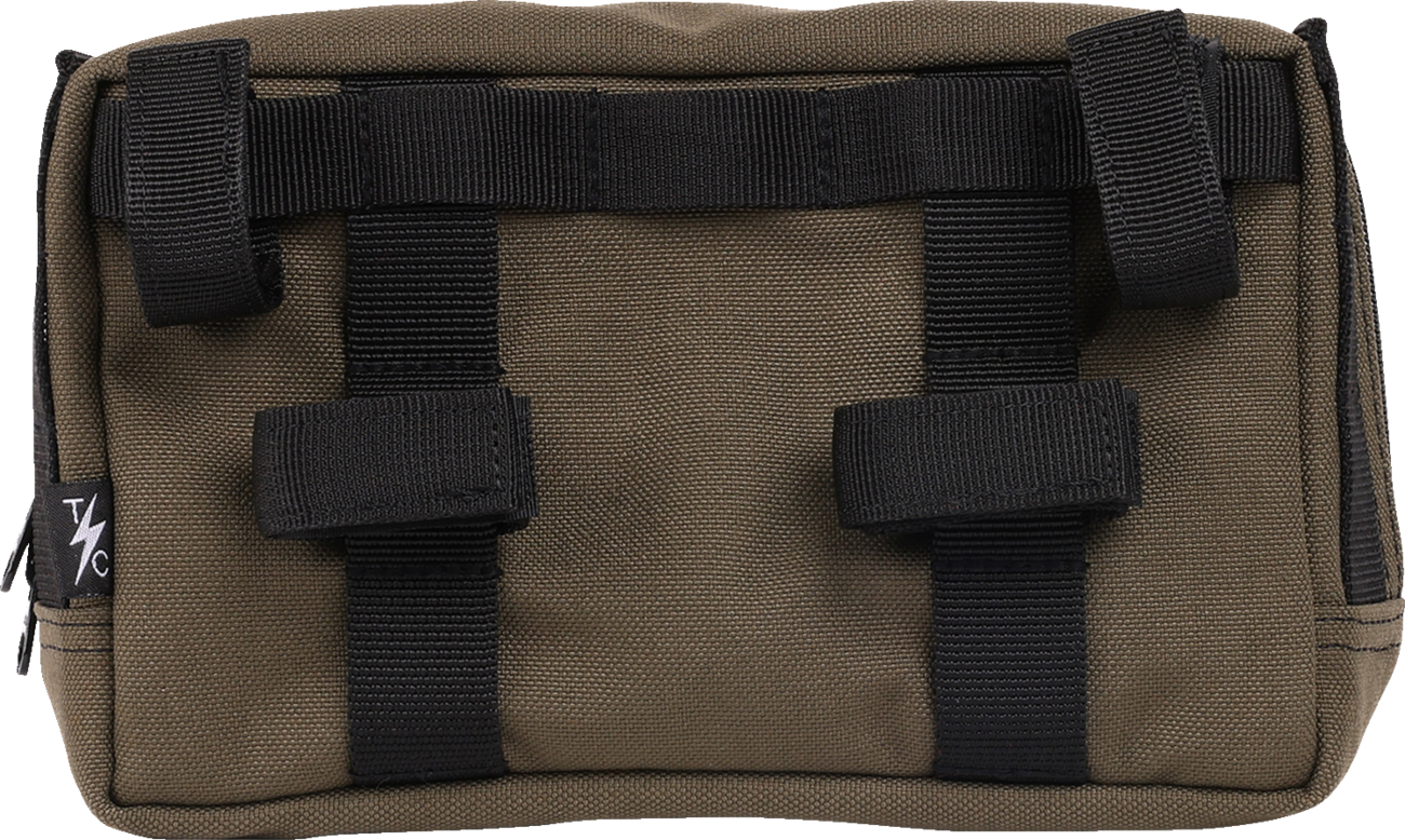 Green handlebar bag by THRASHIN SUPPLY CO. with adjustable straps and compact storage for cycling gear.