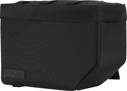 Black leather motorcycle saddlebags with THRASHIN SUPPLY CO. branding, 10-liter capacity, mounted on a cruiser bike.