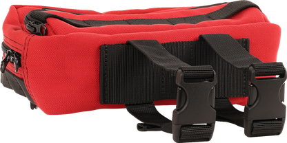 Red THRASHIN SUPPLY CO. Handlebar Bag Plus mounted on a bicycle handlebar, showing its compact design and secure strap system.